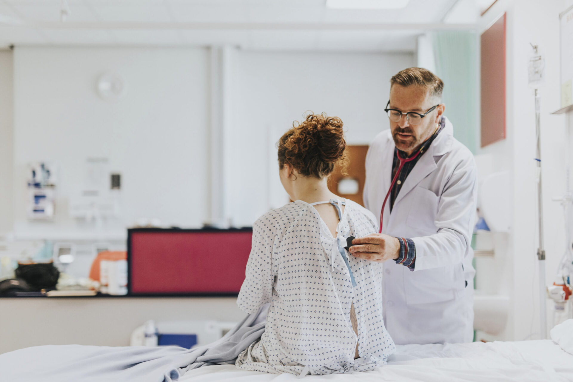 Physician doing a medical checkup on a patient